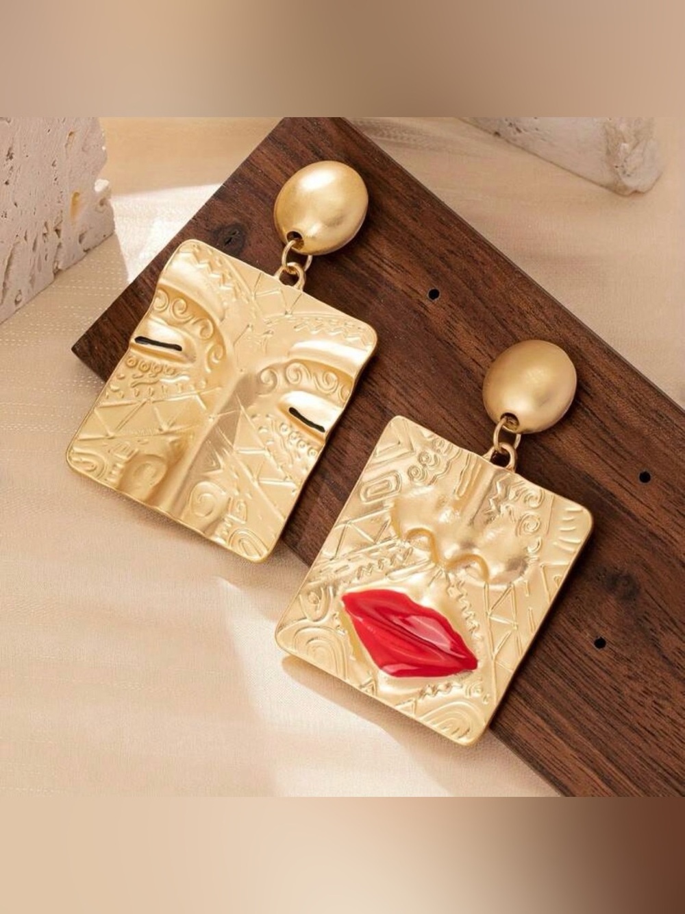 New Arrivals! Gold-tone Sculpted Face Drop Earrings with Red Accent